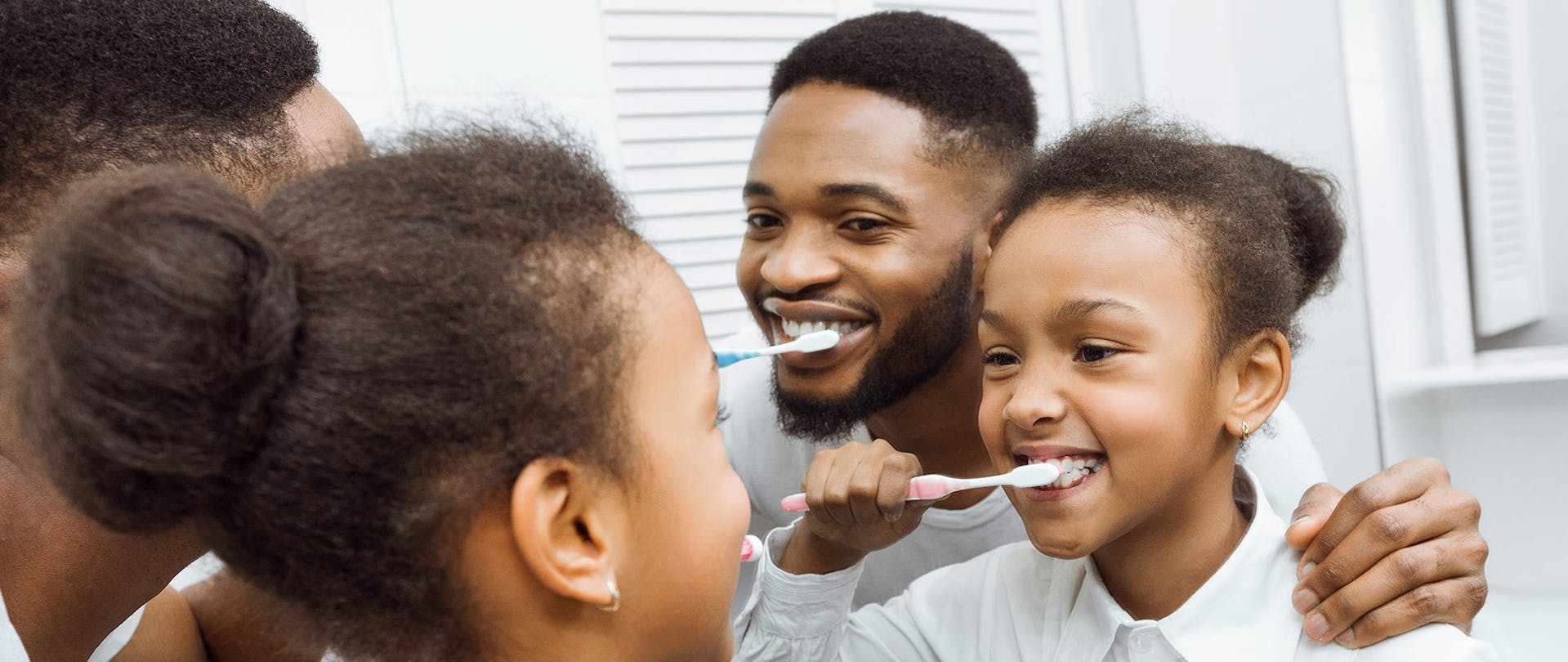 Fluoride in Water Family Brushes Teeth using Fluoride