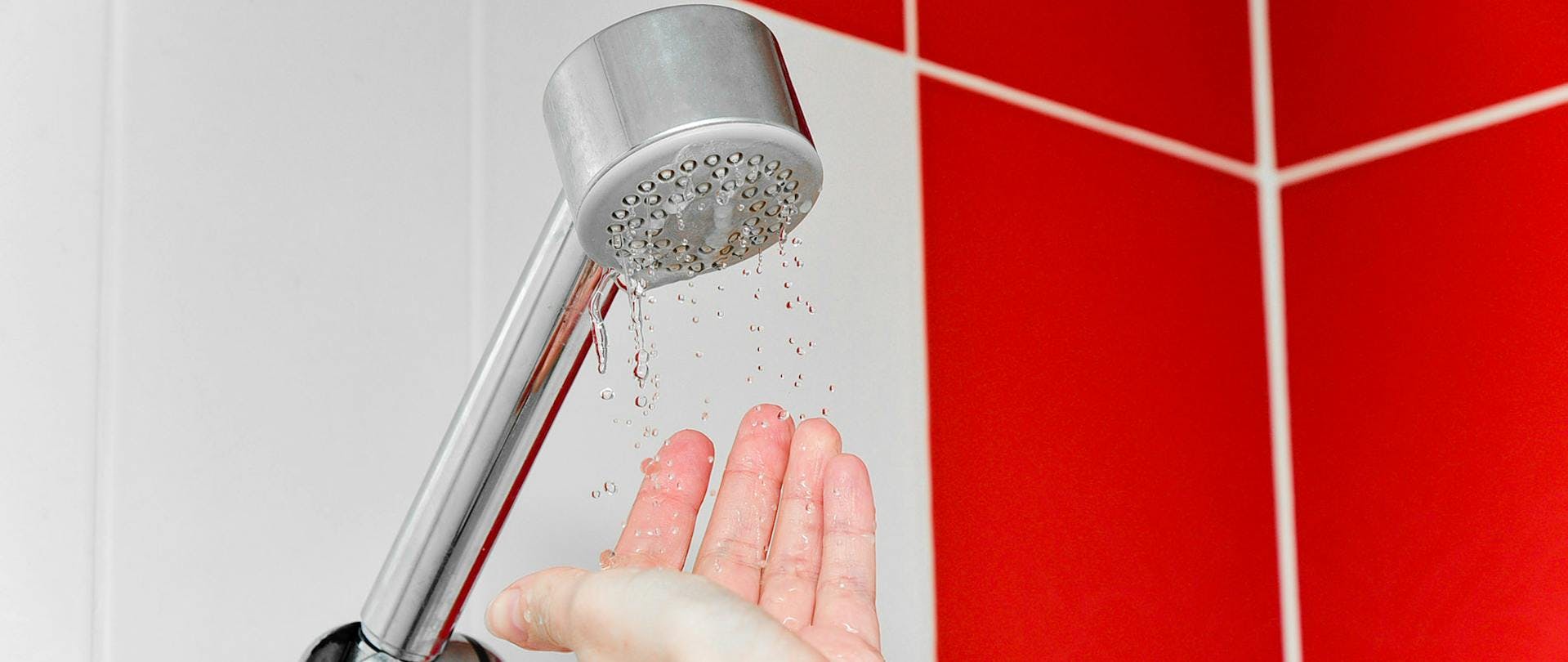 Low Water Pressure Shower Hand Showing Dripping Image