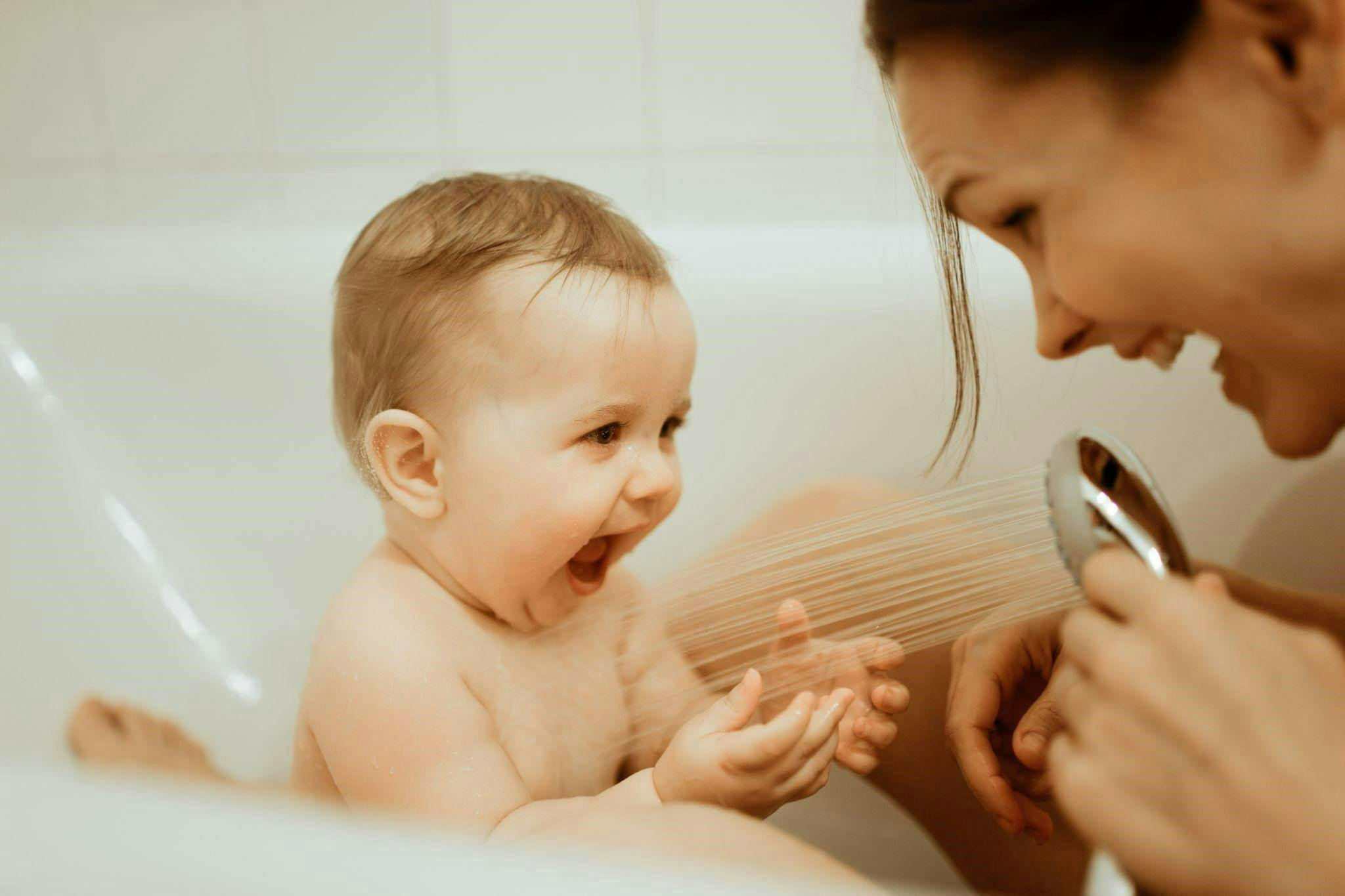 Water Softeners Photo showing Baby Happy with Mother