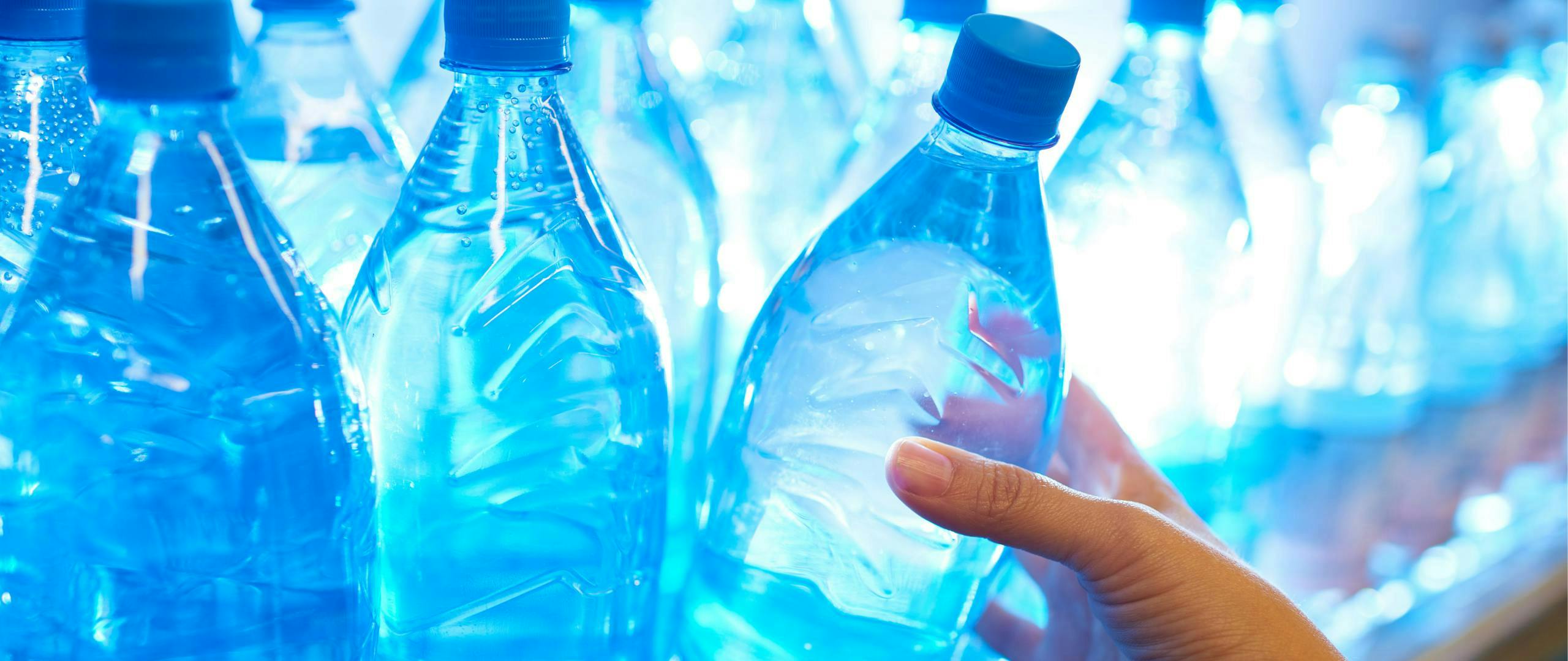 Person Buying Bottled Water | Water Cost